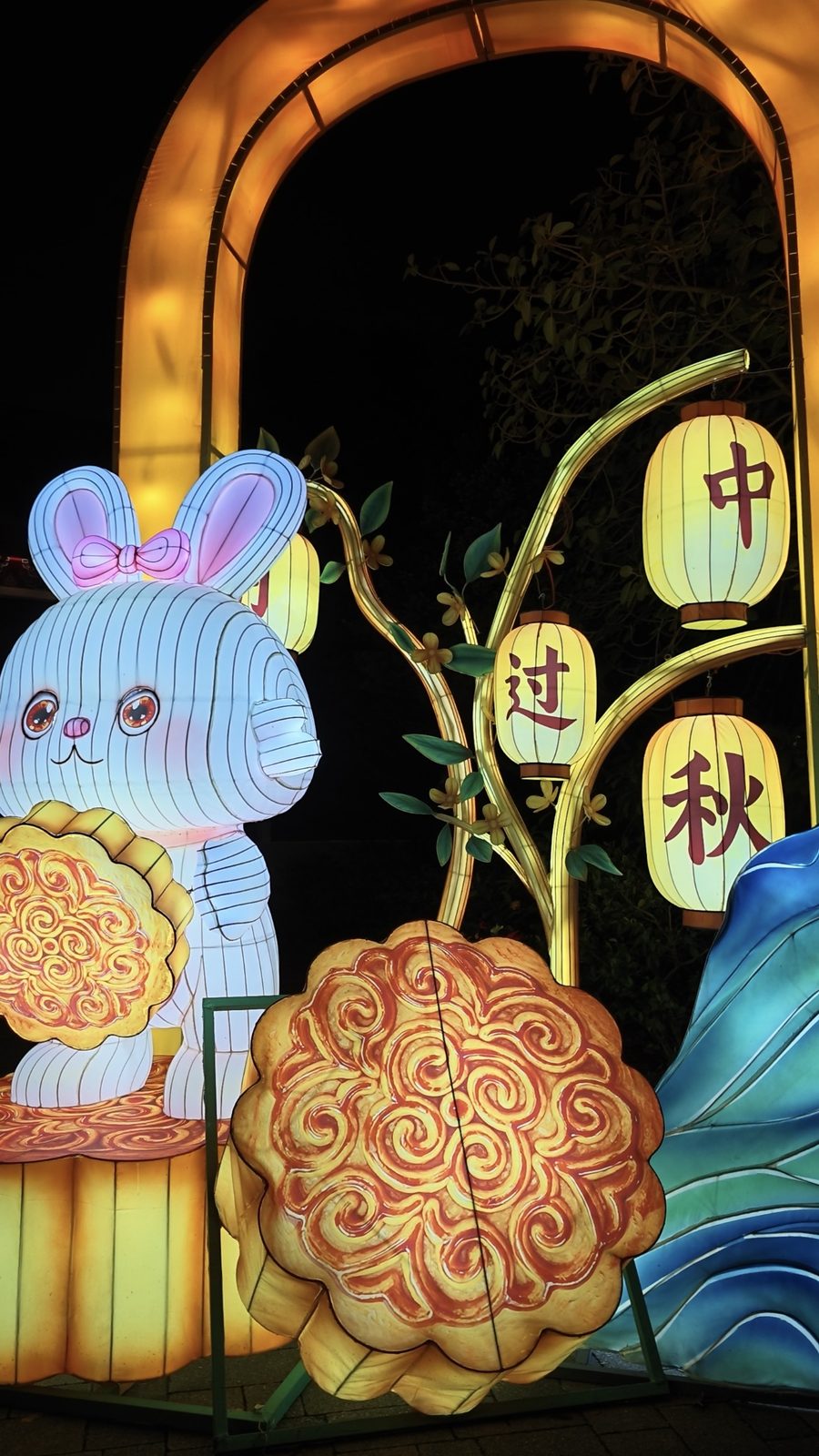 A rabbit lantern with giant mooncakes and Mid-Autumn lanterns